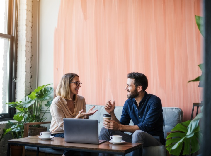 Two founders talking in their office (illustrative image)
