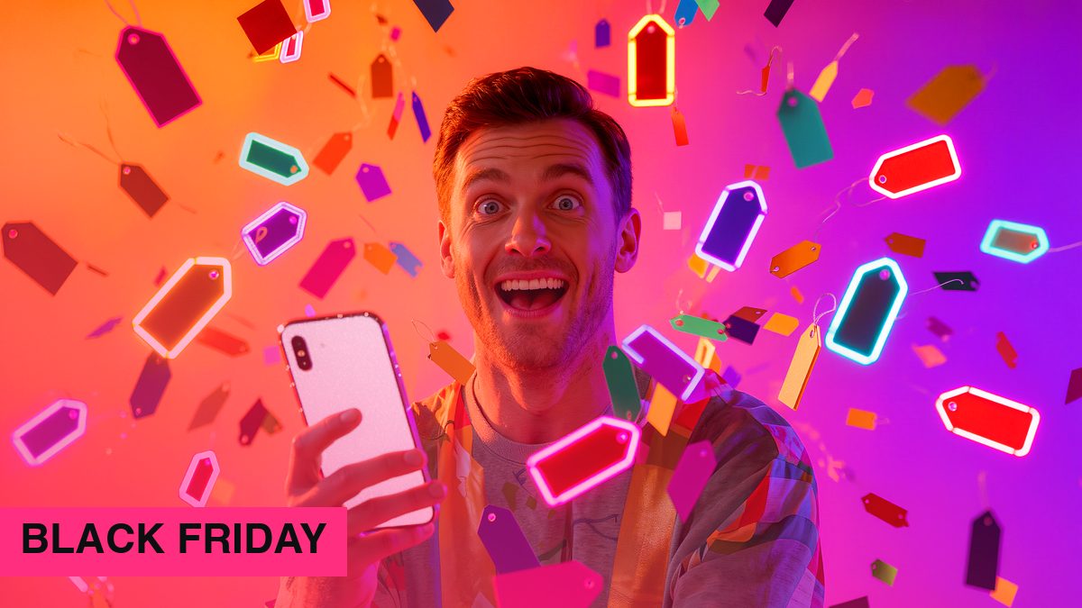 Man looking excitedly at his smartphone with colourful price tags floating around him, magazine look in orange and violet
